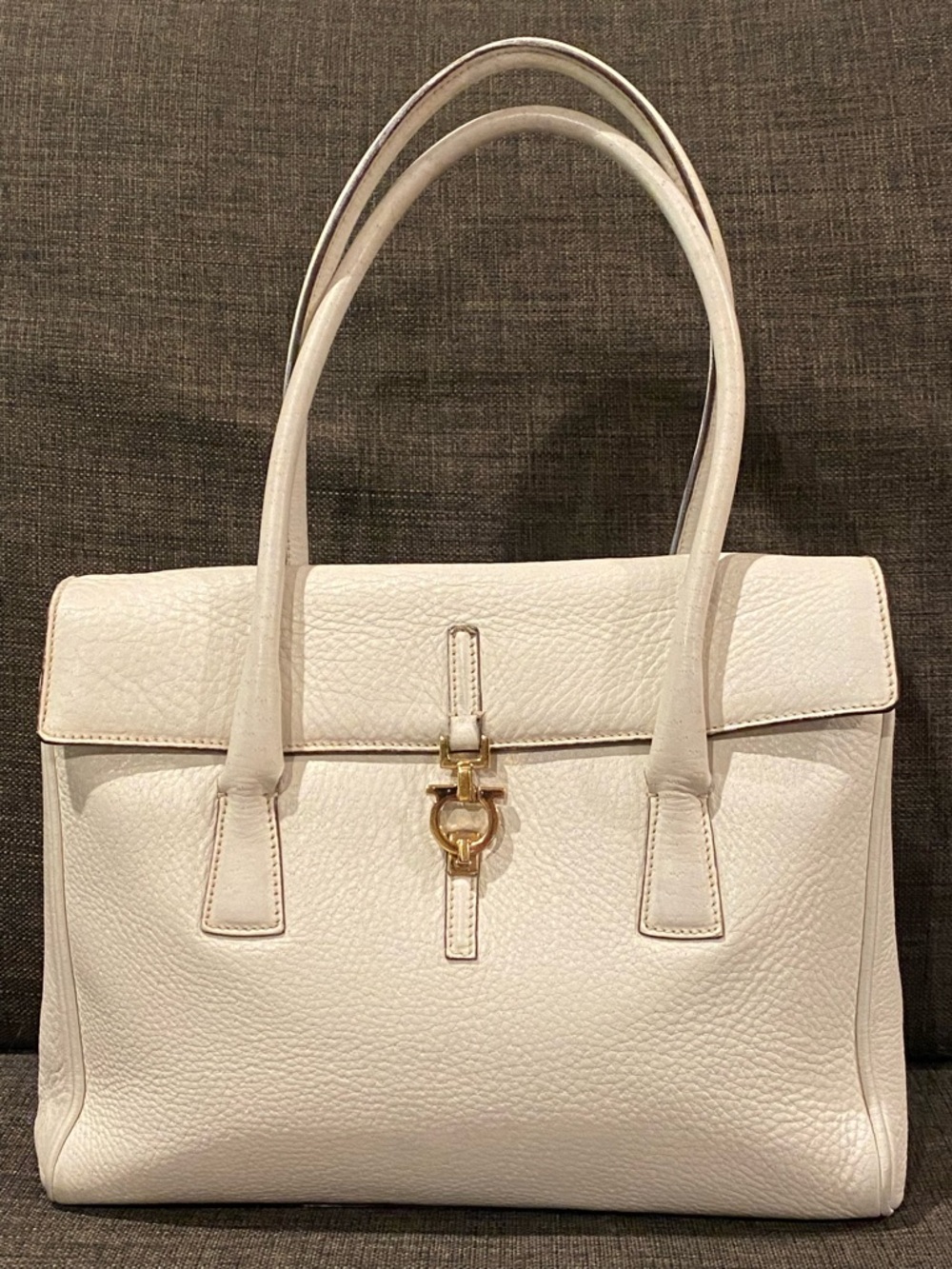 Salvatore Ferragamo Gancini Cream Leather Handbag with Gold Hardware.